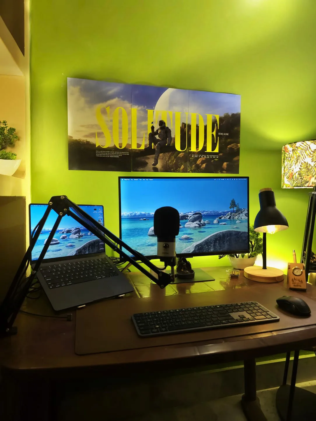 My desk: MacBook Air, Samsung monitor, mic on a boom, keyboard, mouse, and lamp